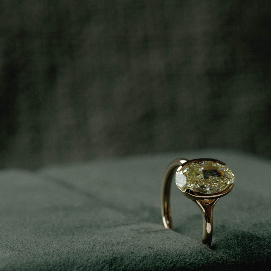 Half Bezel of Oval Yellow Natural Diamond