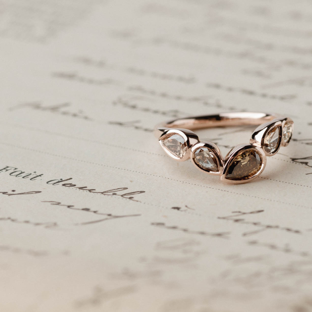 Soft Curve Bezel of Champagne Pear Natural Diamonds