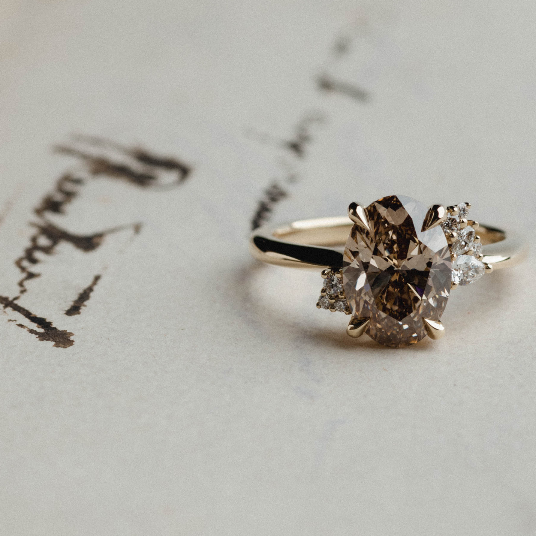 Asymmetrical Cluster of Champagne Oval Natural Diamond