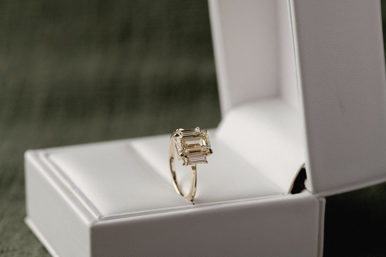 Three Stone of Emerald & Baguette