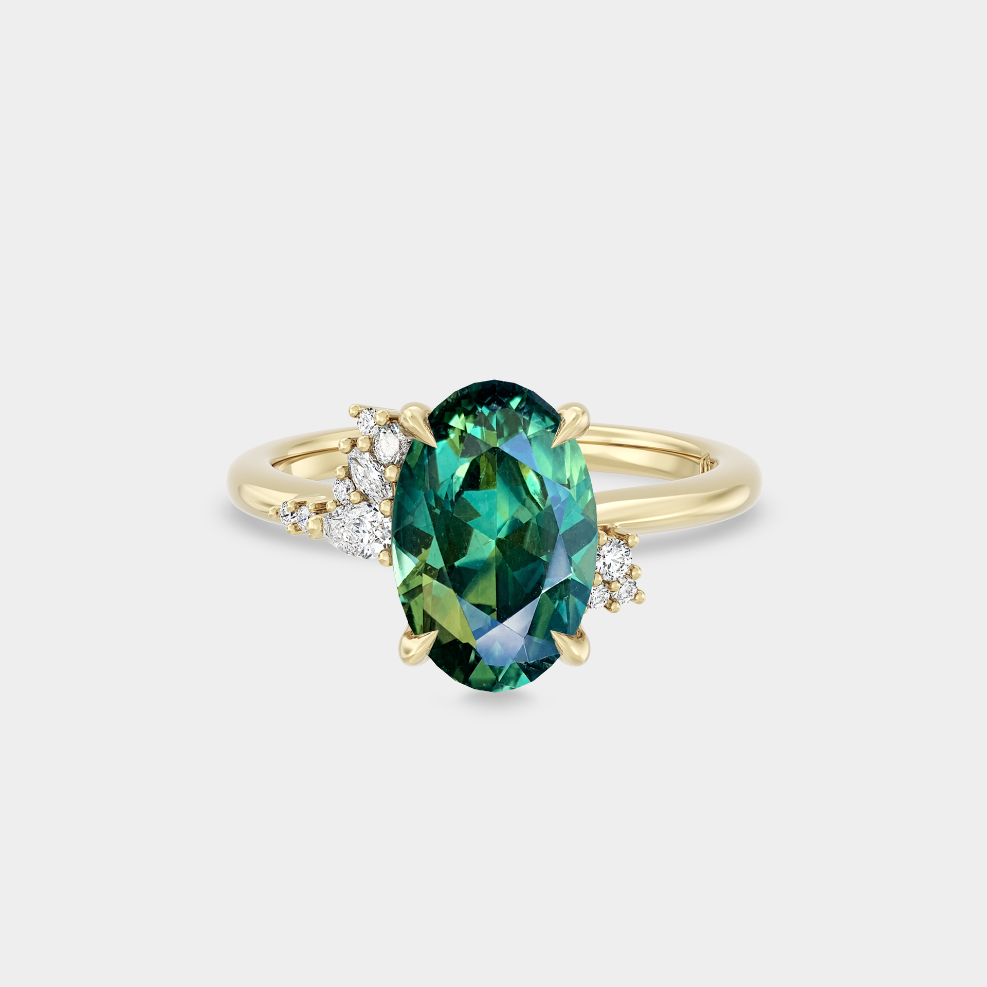 Asymmetrical Cluster of Oval Sapphire & Diamond