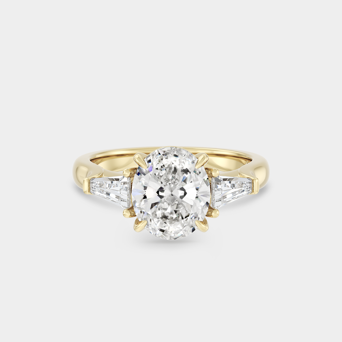 Three Stone of Lab Grown Oval Diamond & Tapered Baguette