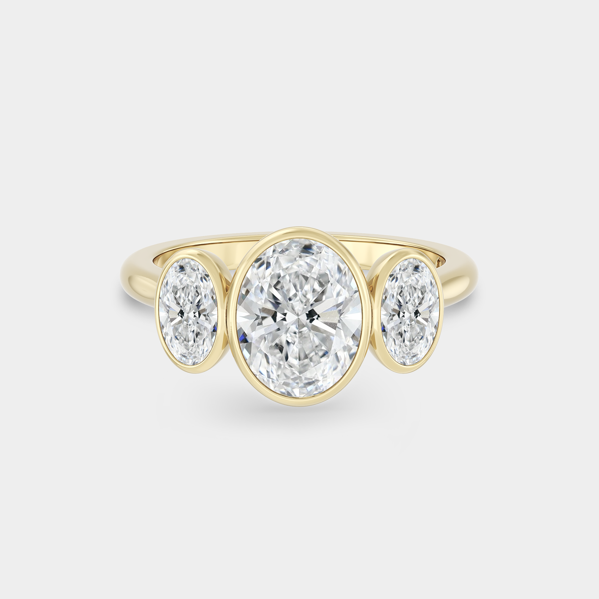 Trilogy of Lab Grown Oval Diamond Bezel Set