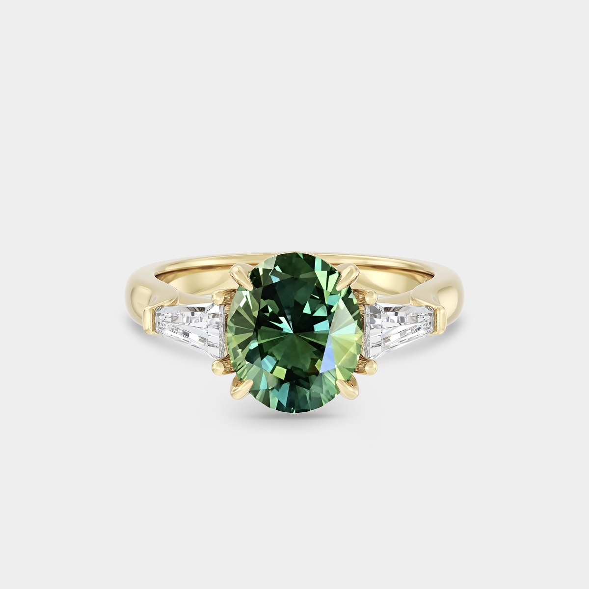 Three Stone of Oval Sapphire & Tapered Baguette