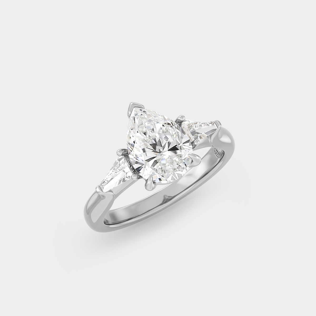 Three Stone of Pear Sapphire & Tapered Baguette
