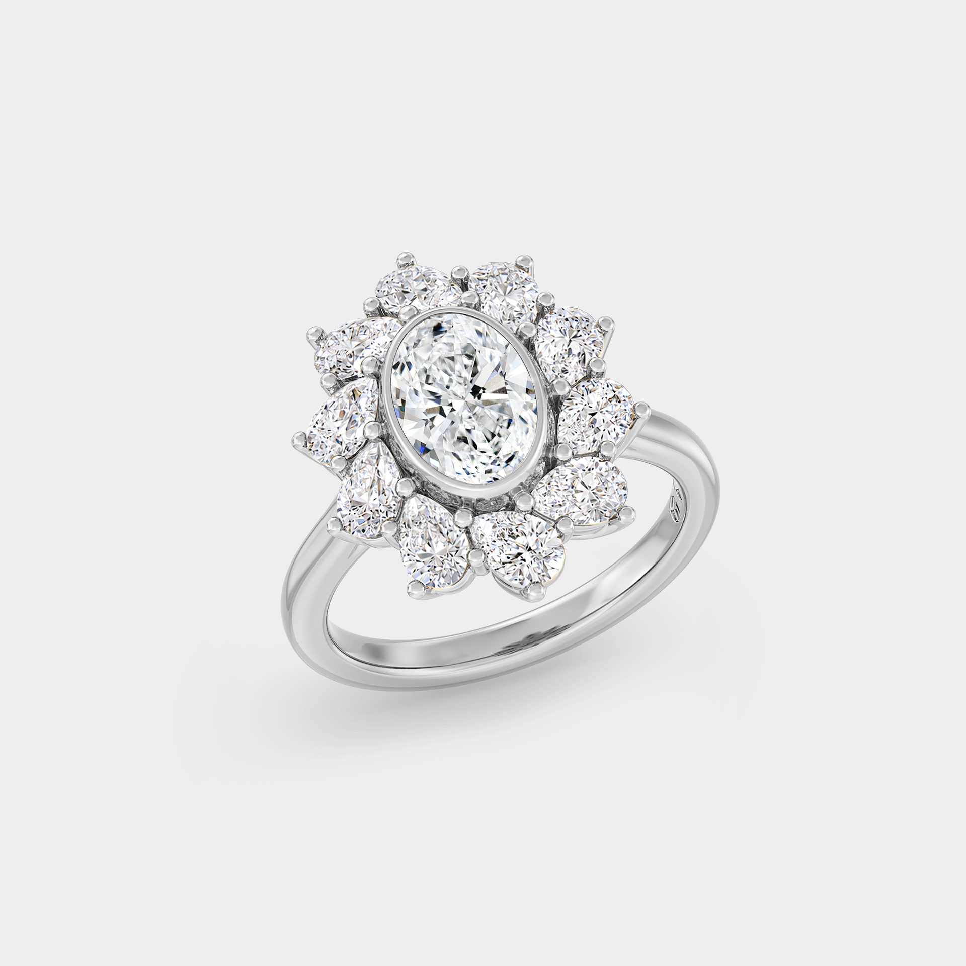 Floral Halo Cluster of Oval Sapphire & White Diamond
