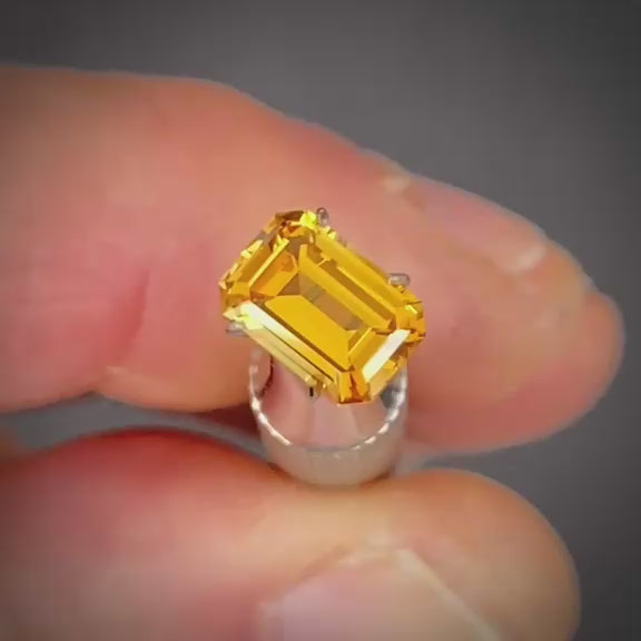 1.50ct Emerald Cut Orange Sapphire