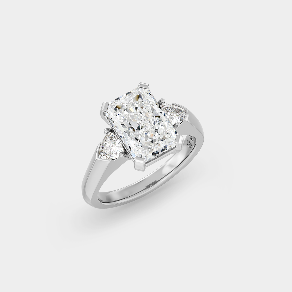 Three Stone of Radiant Cut Sapphire & Trillion