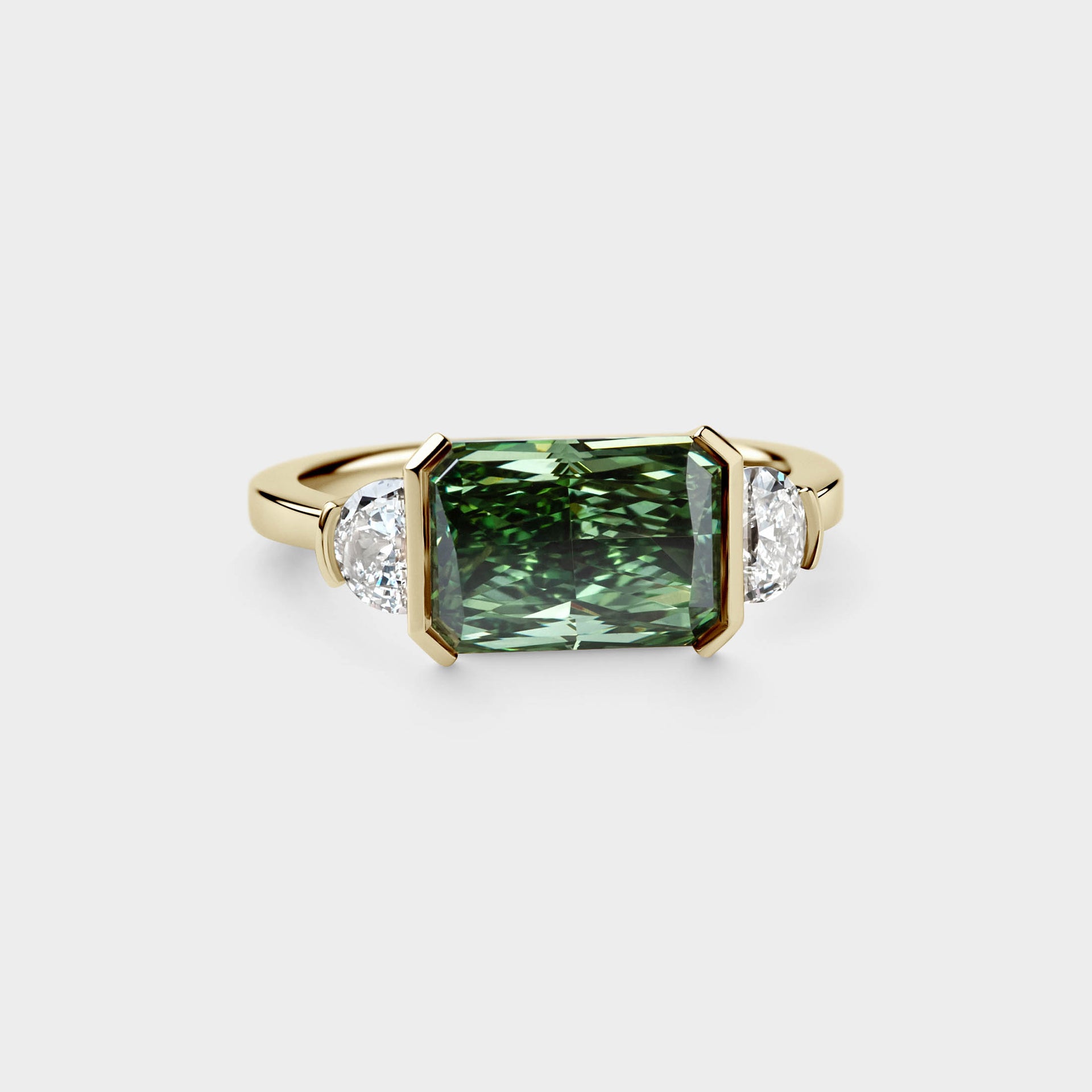 3.14ct East-West Half Bezel of Green Radiant & Half Moon