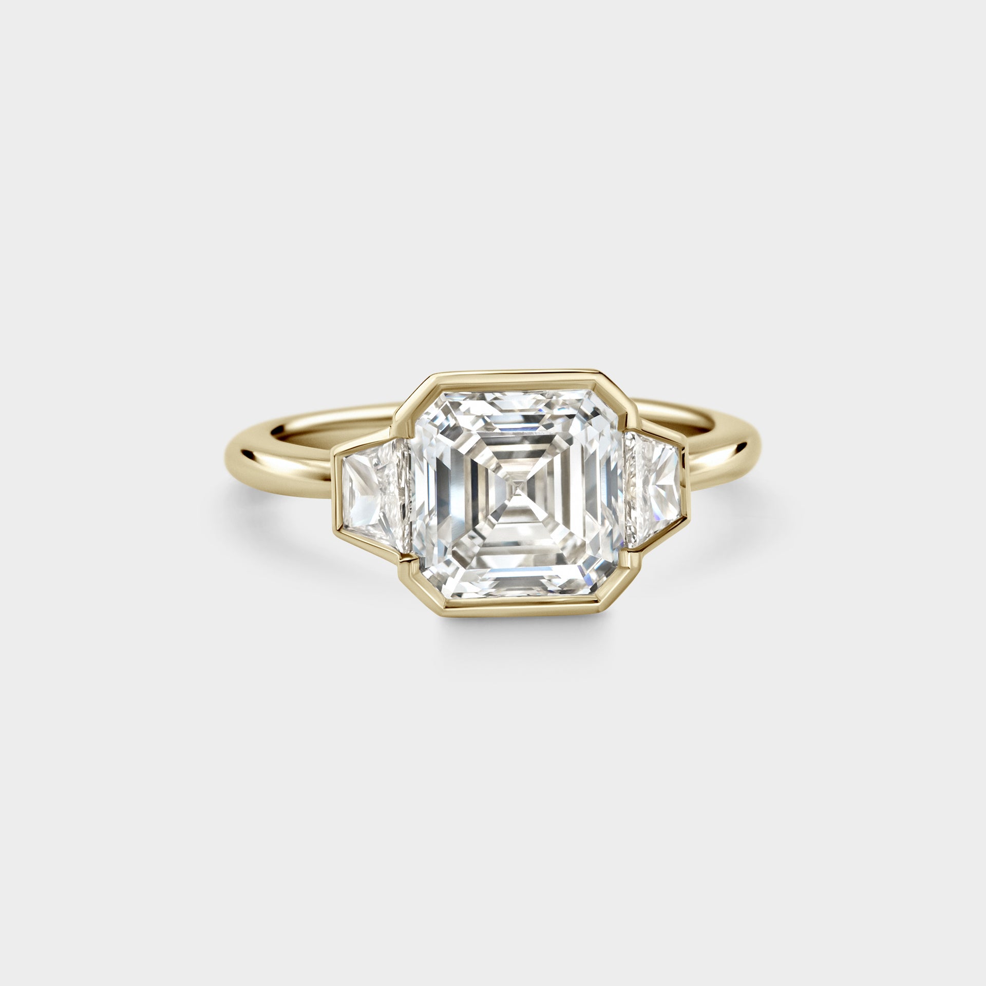 Three Stone of Asscher & Trapezoid in Continuous Bezel