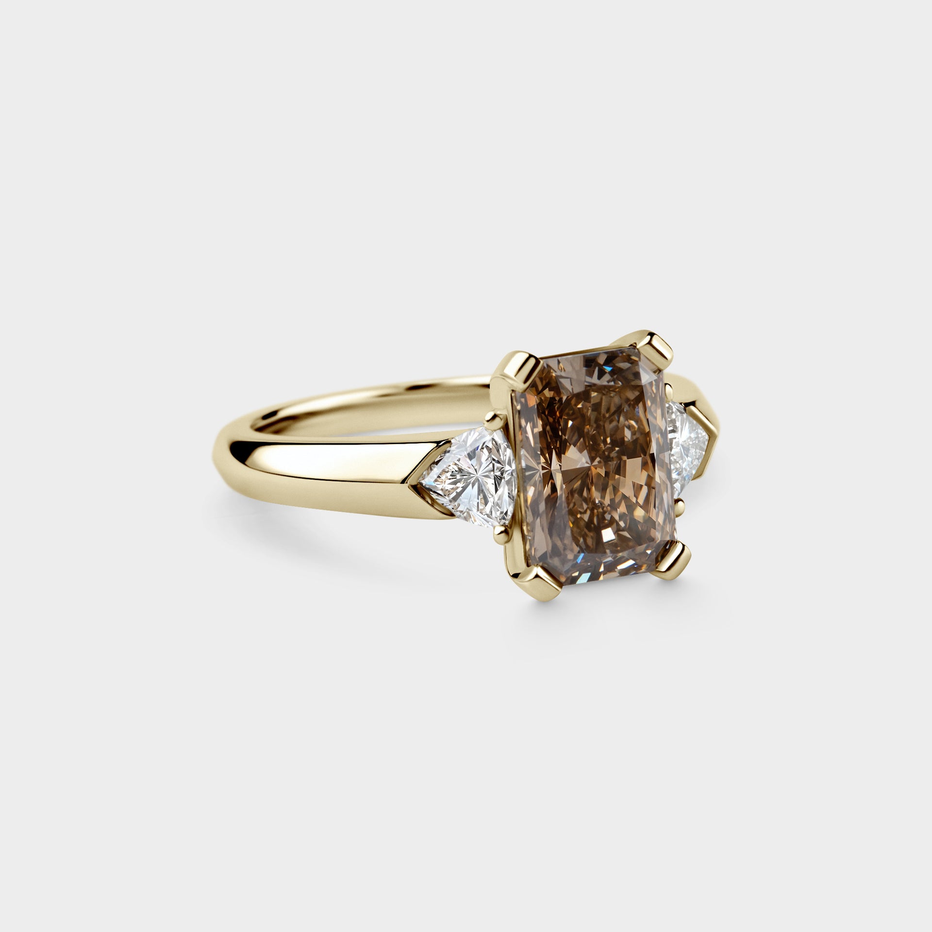 2.09ct Three Stone of Champagne Radiant & Trillion