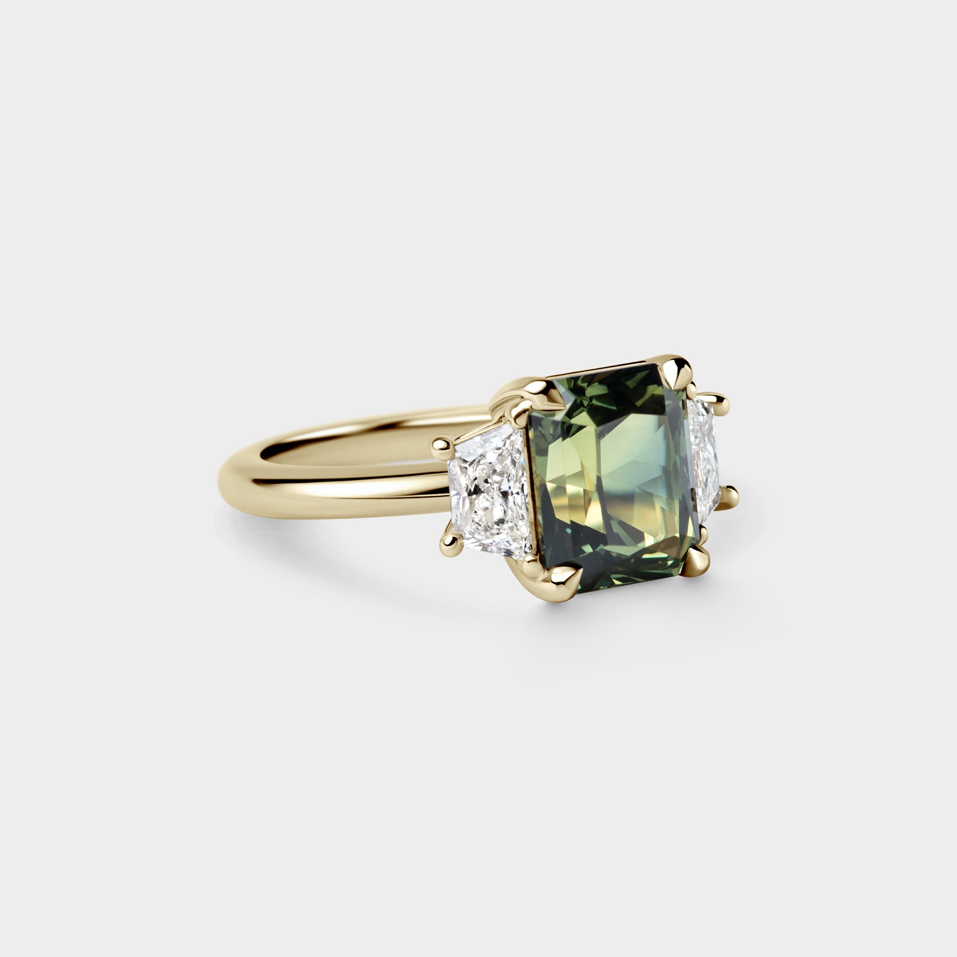 3.14ct Three Stone of Radiant Sapphire & Trapezoid