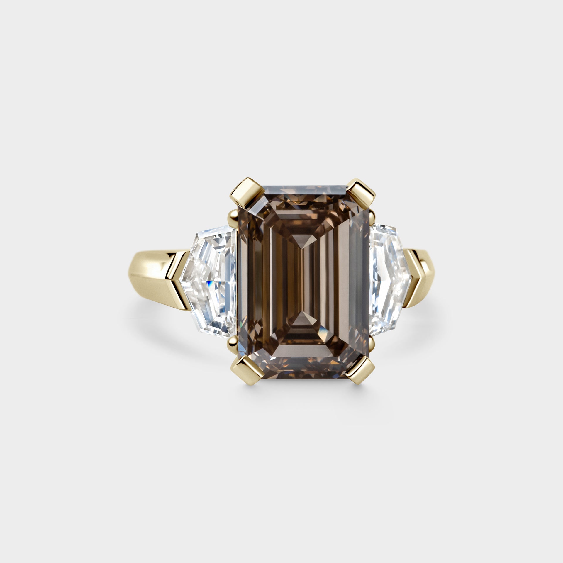 6.09ct Three Stone of Champagne Emerald & Trillion