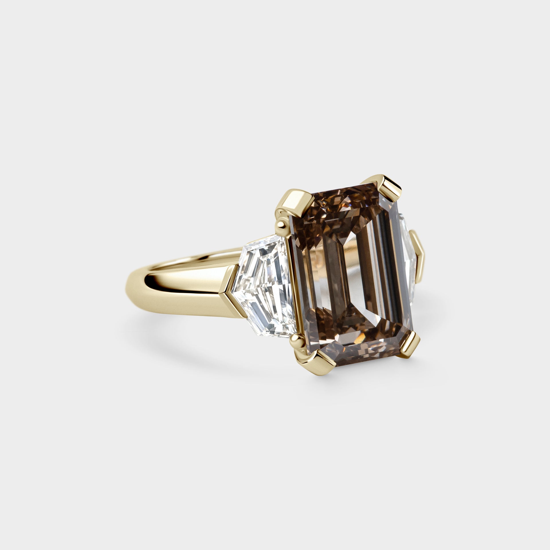 6.09ct Three Stone of Champagne Emerald & Trillion