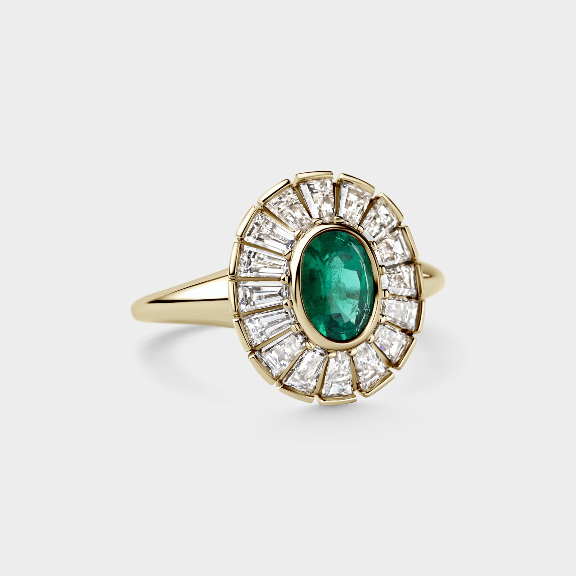 0.71ctct Oval Emerald & Tapered White Diamond Baguettes