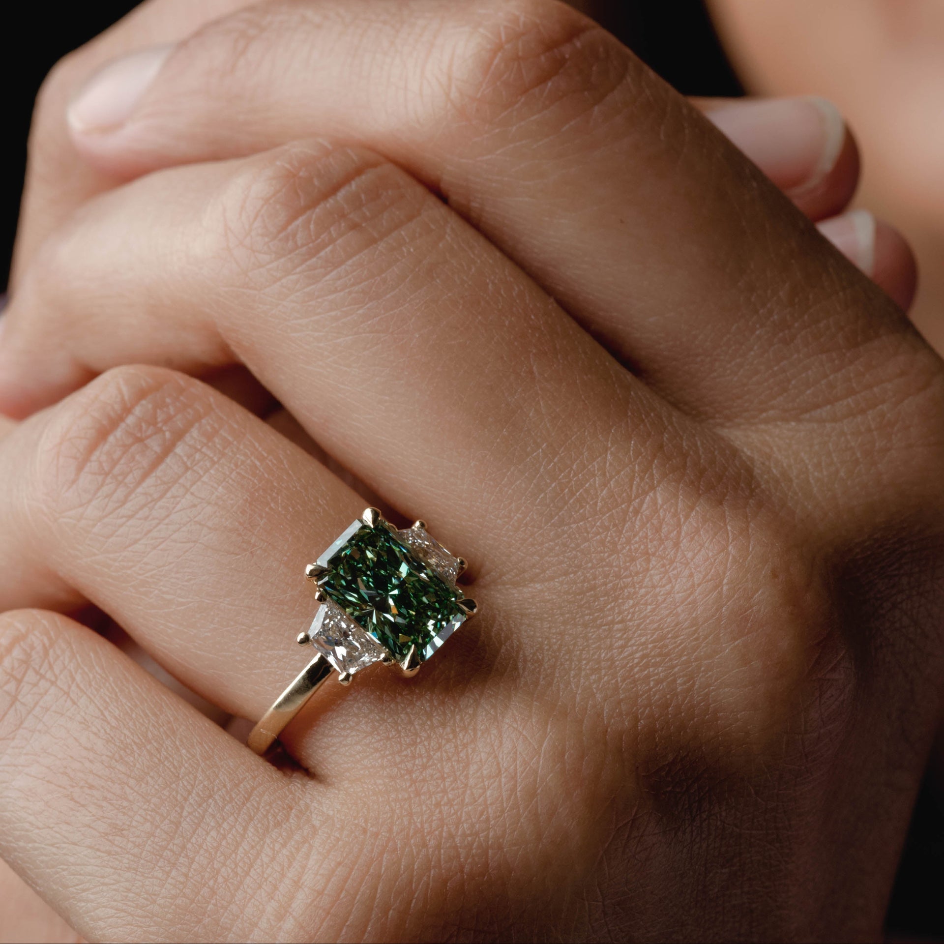 3.28ct Three Stone of Green Radiant & Trapezoid