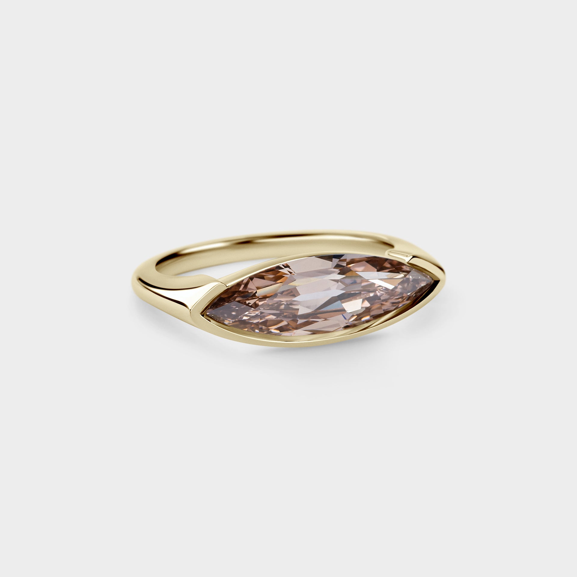 1.98ct East West Three Quarter Bezel of Champagne Moval