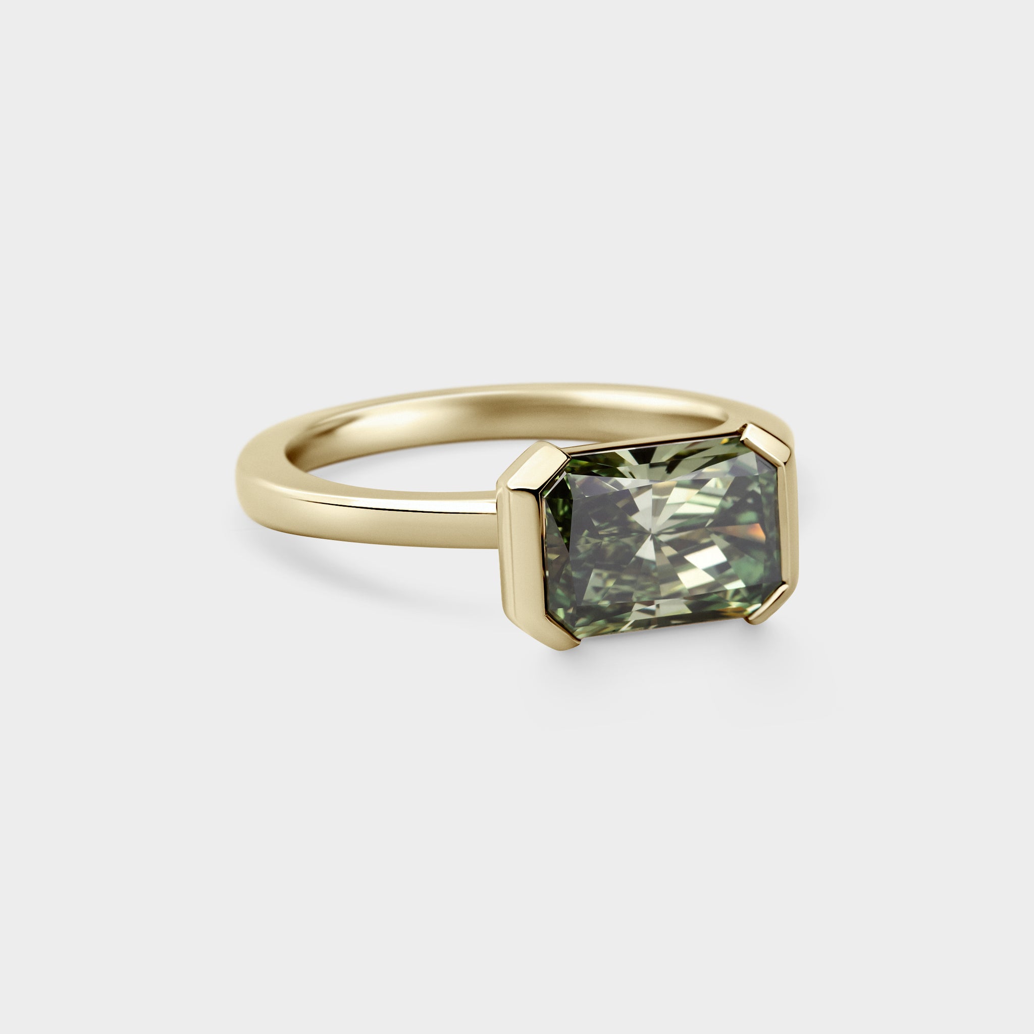 2.20ctct  East-West, Half Bezel of Fancy Green Radiant