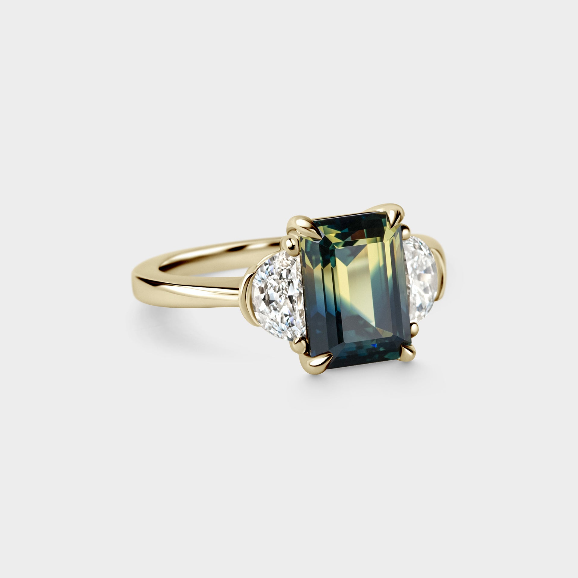 3.71ct Three Stone of Emerald Cut Parti Sapphire & Half Moon