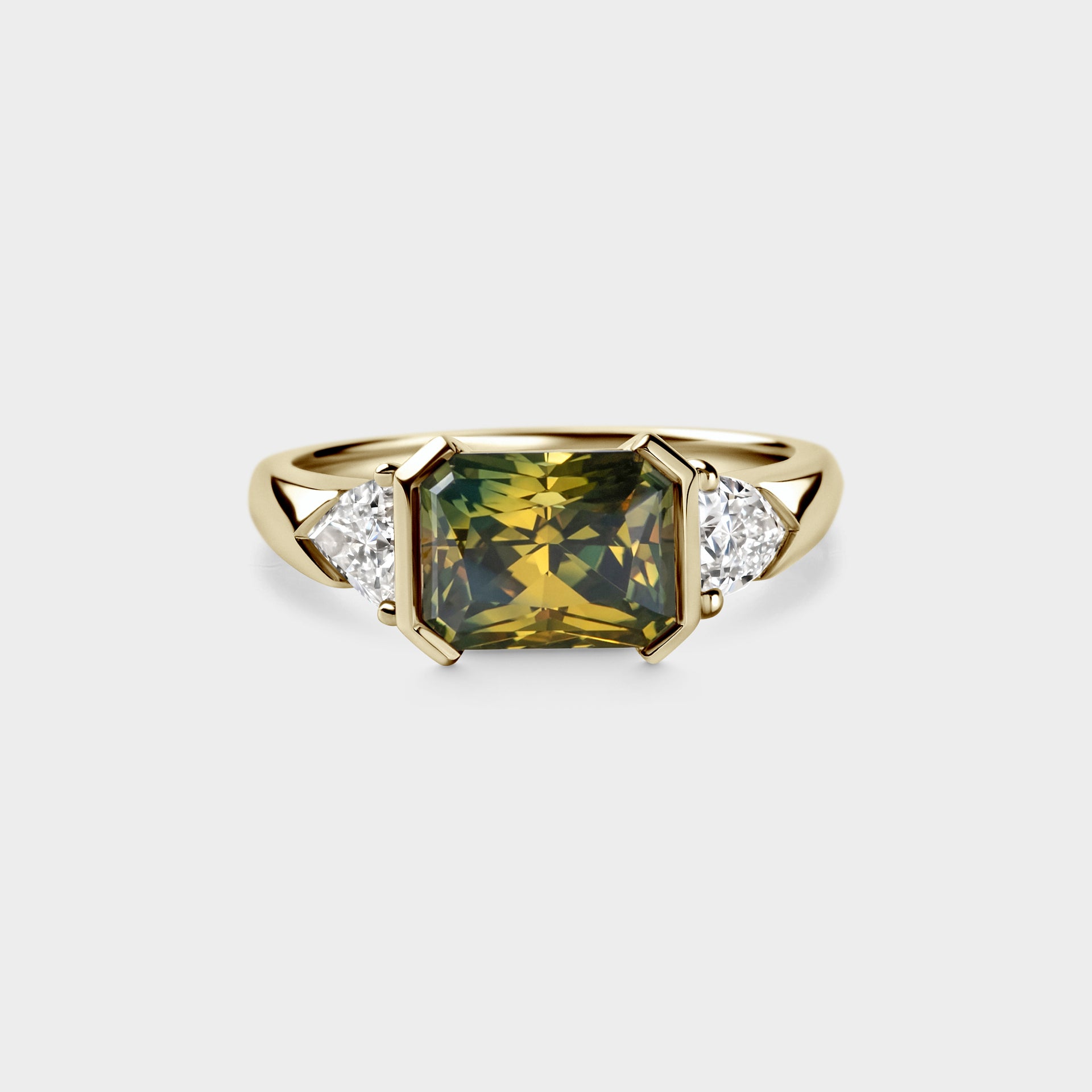 2.97ct Three Stone of Radiant Parti Sapphire & Trillion