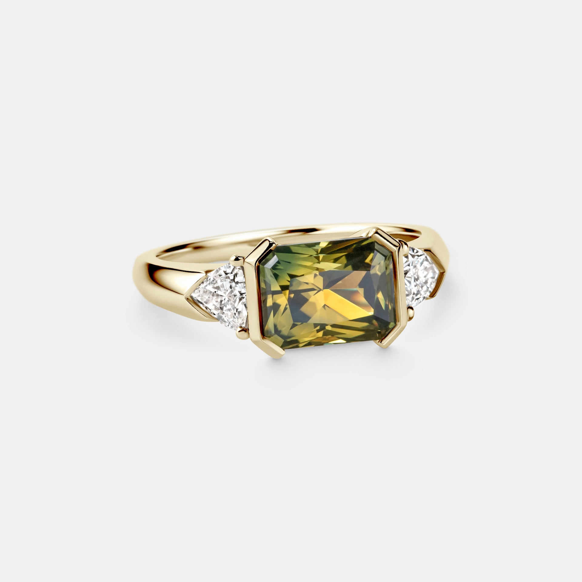 2.97ct Three Stone of Radiant Parti Sapphire & Trillion