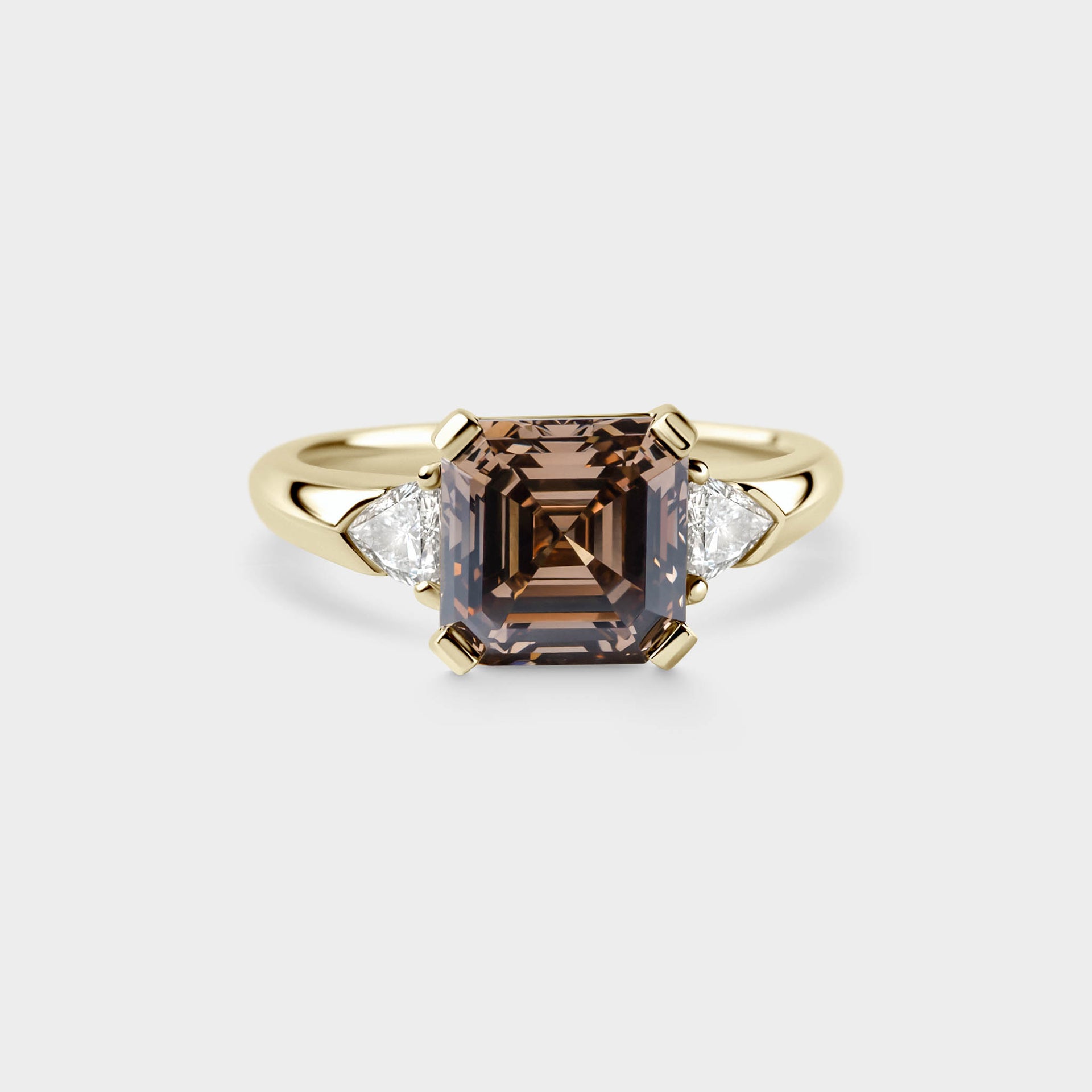 3.02ct Three Stone of Champagne Asscher & Trillion