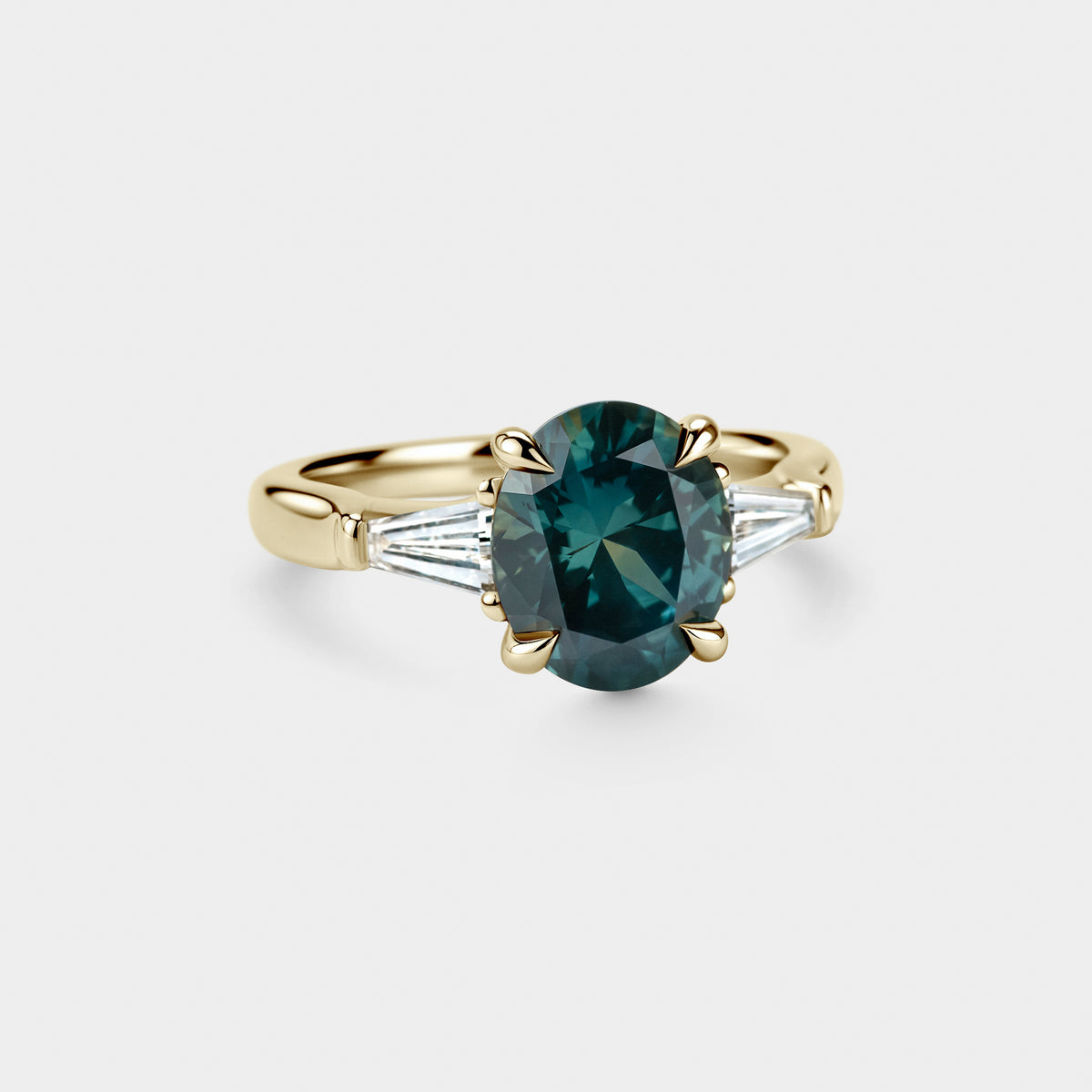 3.29ct Three Stone of Oval Teal Sapphire & Tapered Baguettes
