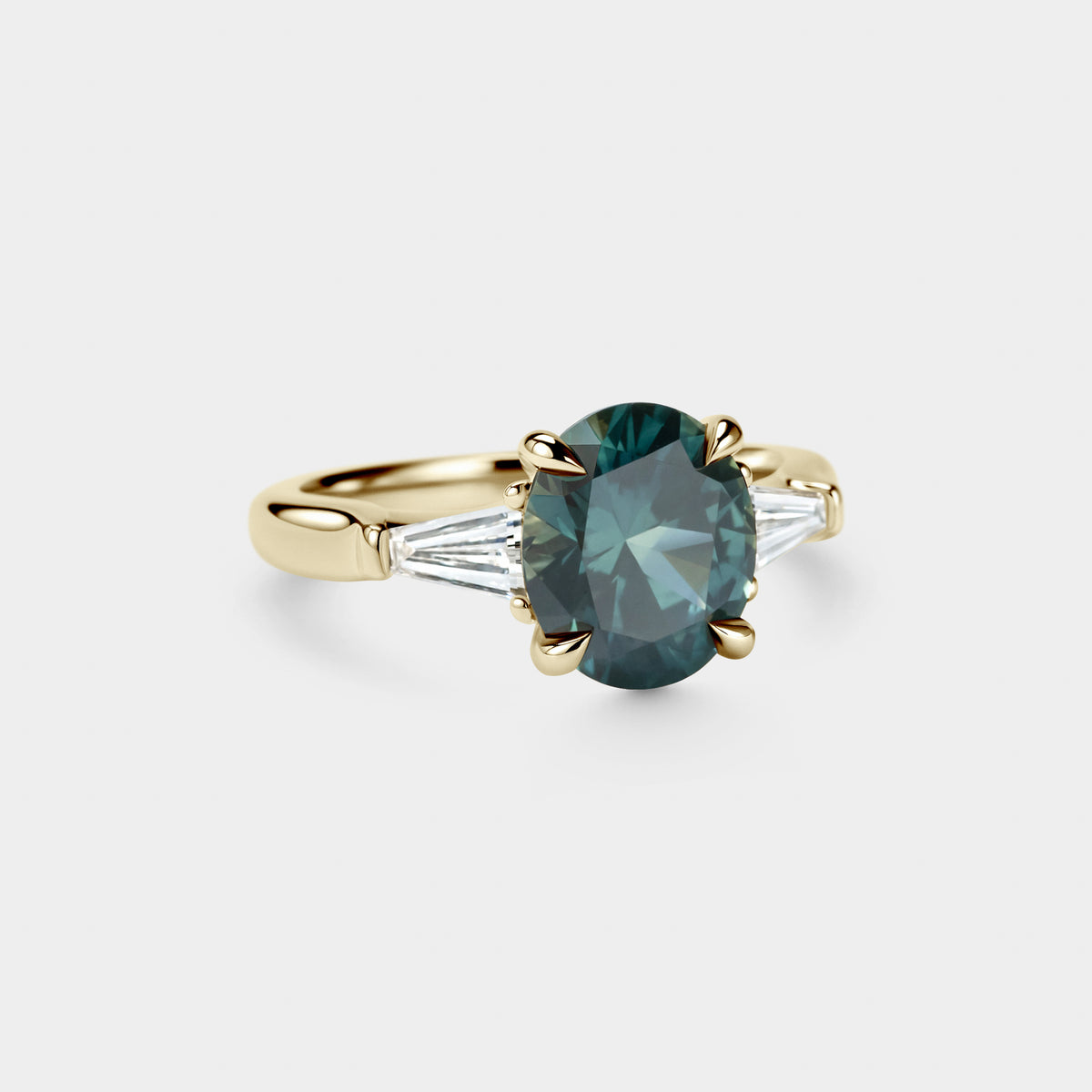 3.29ct Three Stone of Oval Teal Sapphire & Tapered Baguettes